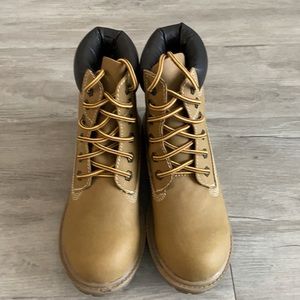 NWT boots for ladies, never worn.  Reasonable offers welcome!